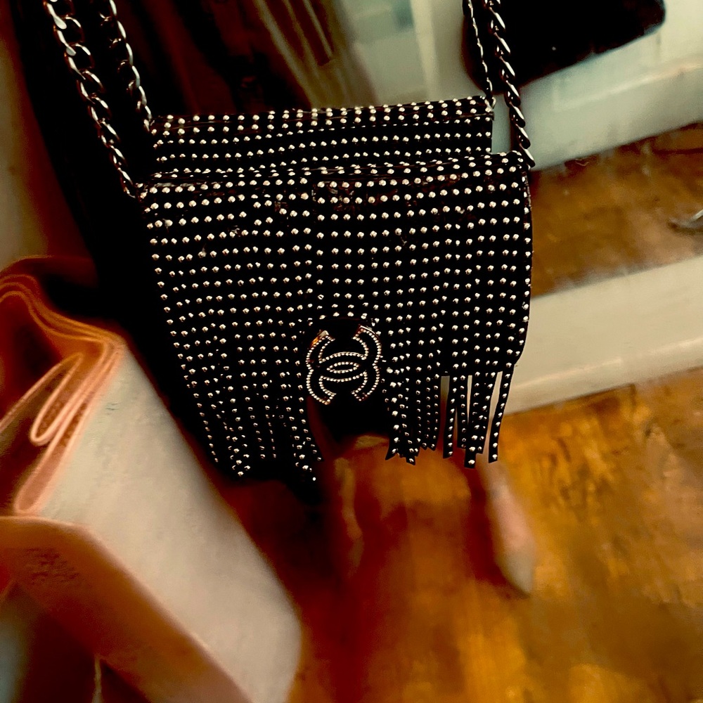 Chanel bifold fringe cross body.